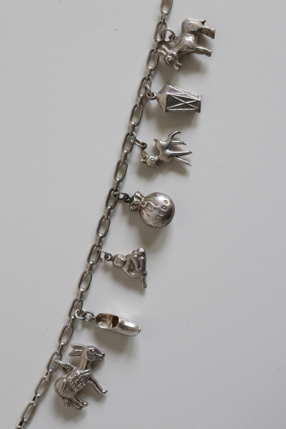 The Whimsical Charm - vintage silver charm bracelet