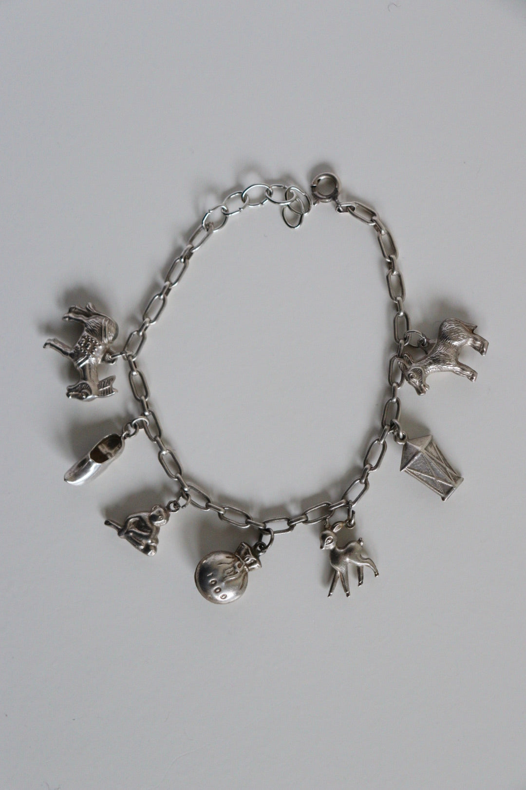 The Whimsical Charm - vintage silver charm bracelet